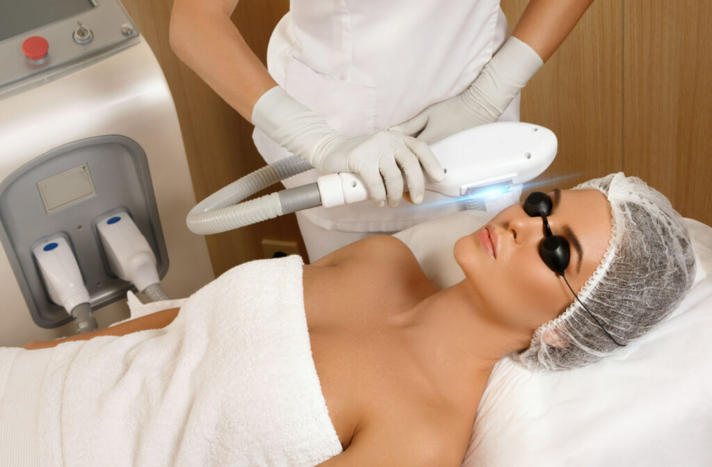 A woman undergoing IPL therapy to alleviate dry eye symptoms.