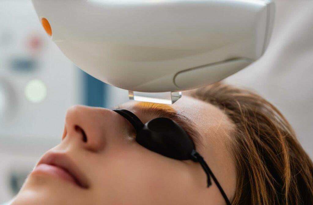 A patient undergoing IPL therapy for dry eye relief.