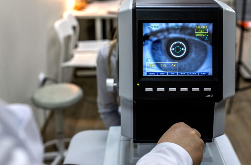 An optometrist uses imaging technology to take a closer look at a patient's eyes.